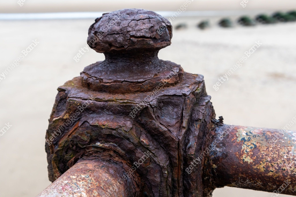Texture of rusty weathered ironwork railings at coast, New Brighton ...