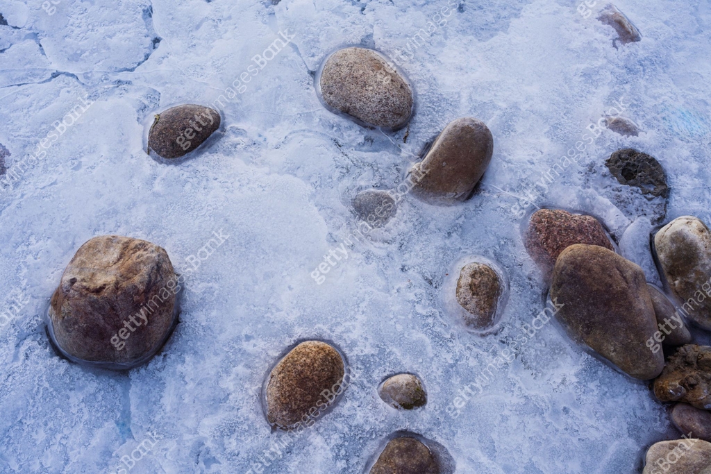 Ice with Frozen Rocks Embedded 이미지 (2194788885) - 게티이미지뱅크