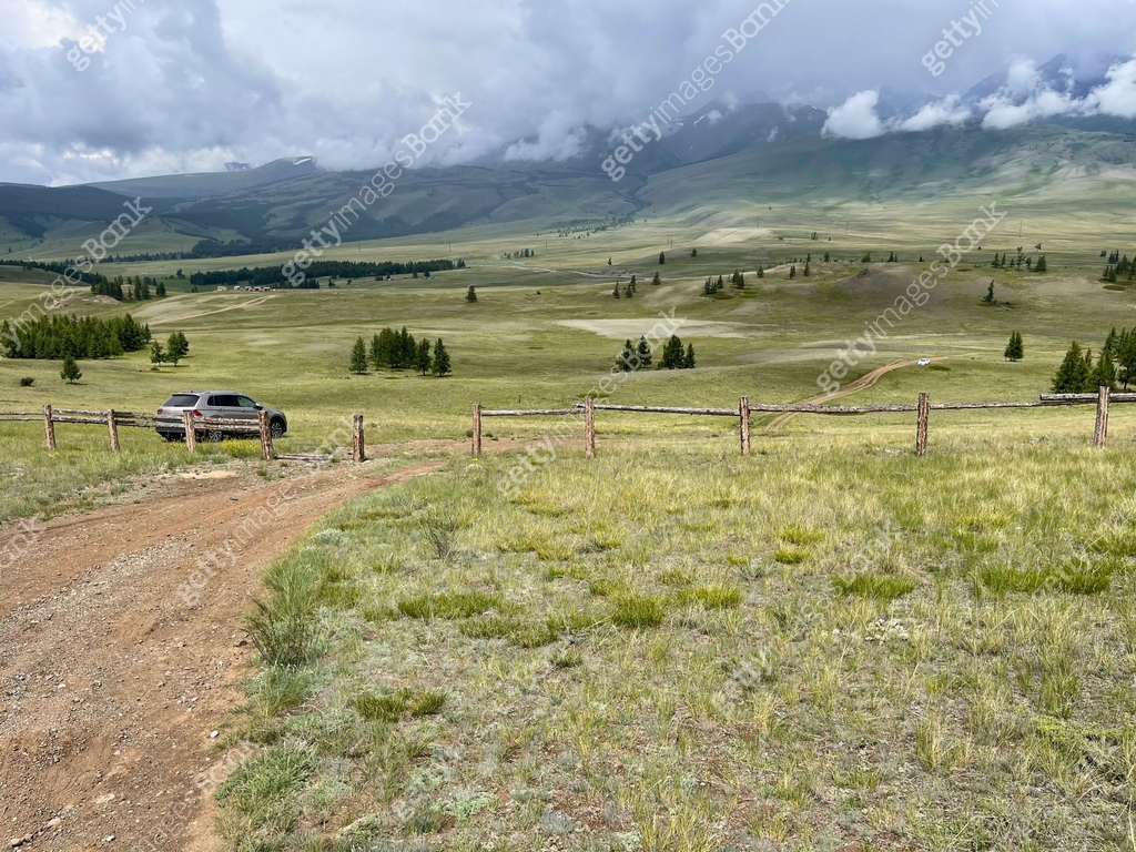 Rural road in the mountains. Altai, Siberia, Russia. Beautiful nature ...