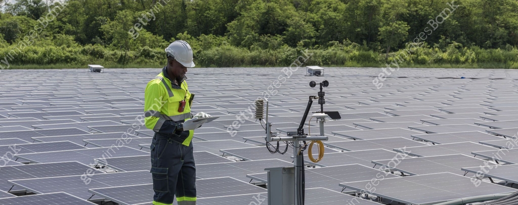 Engineer Checking and working setup Floating solar panels or solar cell ...