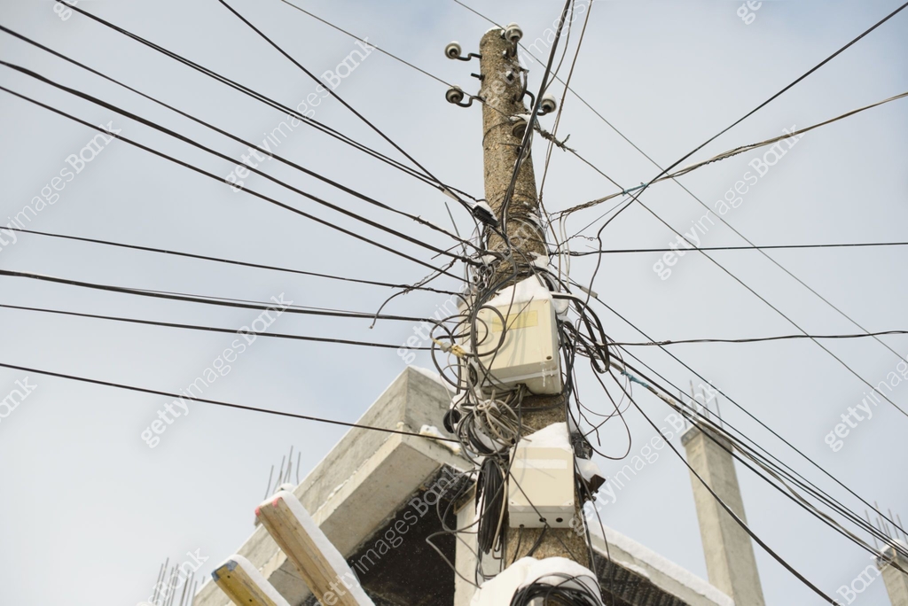 Overloaded Utility Pole with Tangled Wires and Electrical Boxes 이미지 ...
