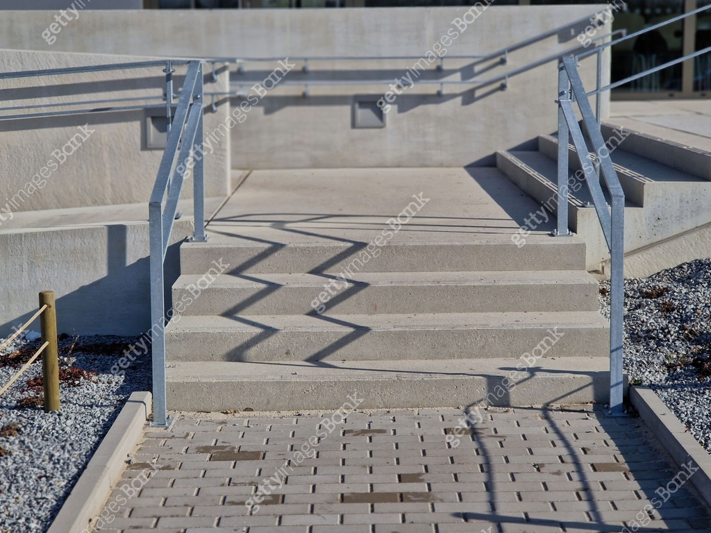 wheelchair ramp and stairs on the other side. height differences are ...