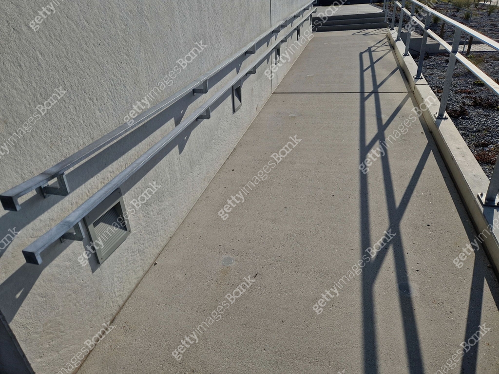 wheelchair ramp and stairs on the other side. height differences are ...