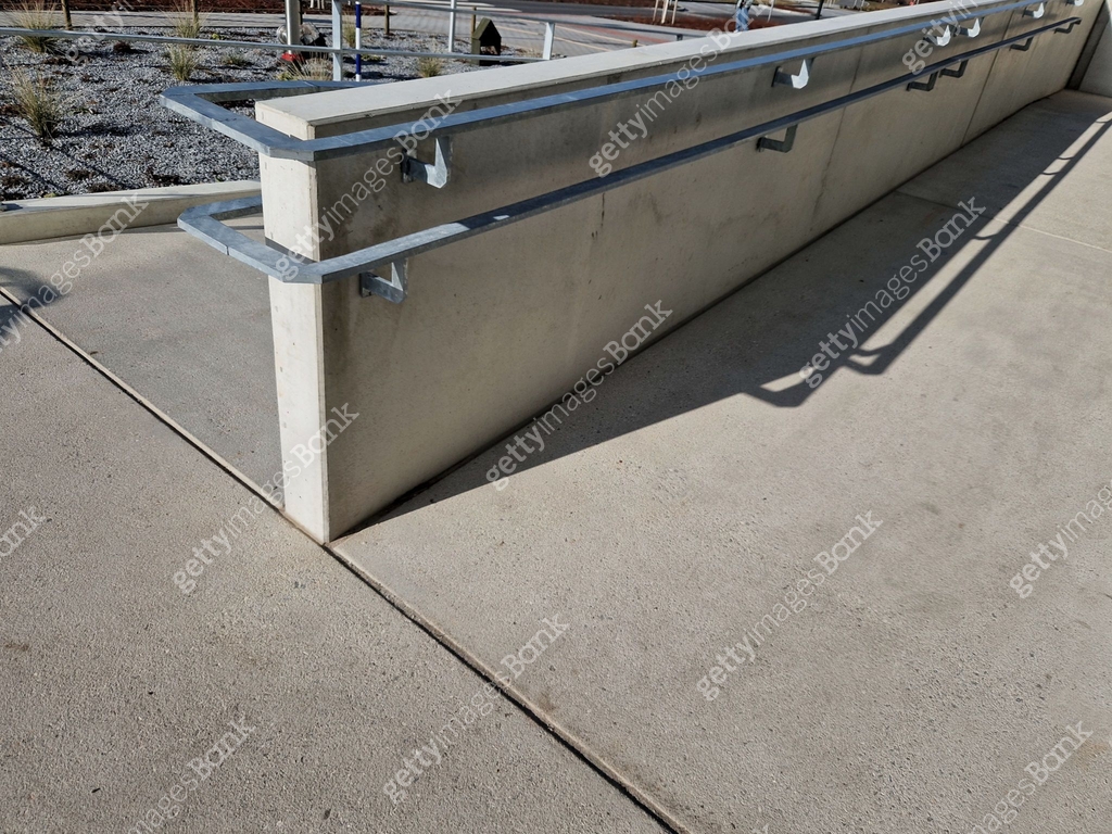 wheelchair ramp and stairs on the other side. height differences are ...