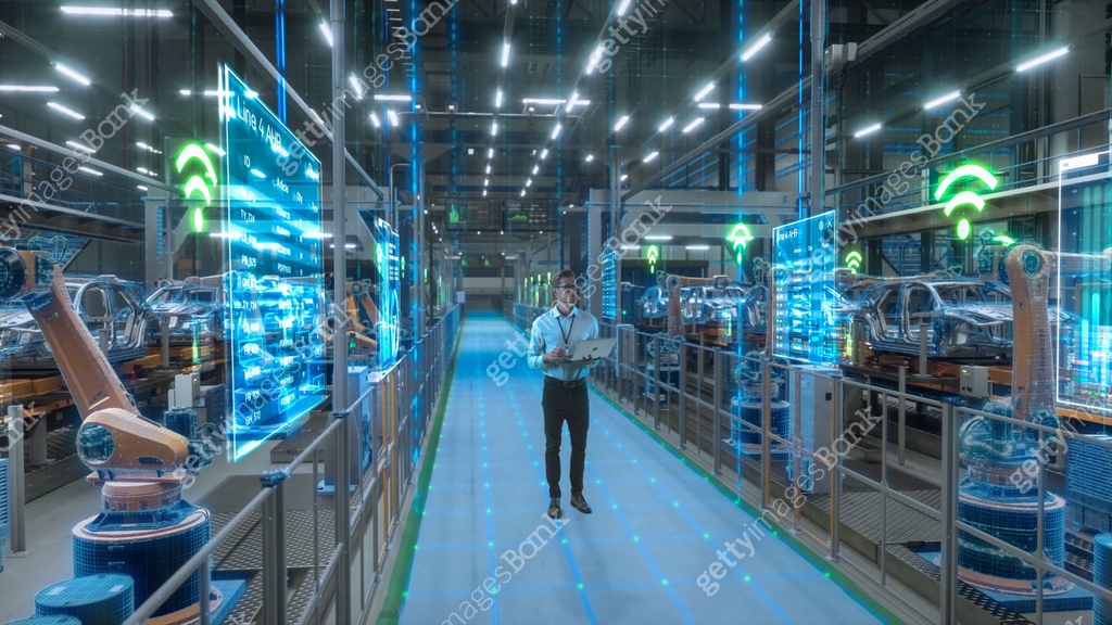 Factory Visualization System Engineer With Laptop Activates Autonomous EV Factory Digitization ...