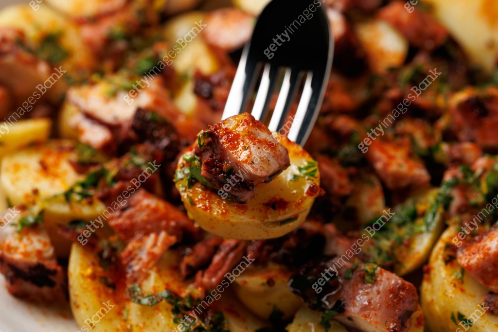 Octopus tentacles and new potatoes warm salad with smoked paprika ... Octopus tentacles and new potatoes warm salad with smoked paprika ...