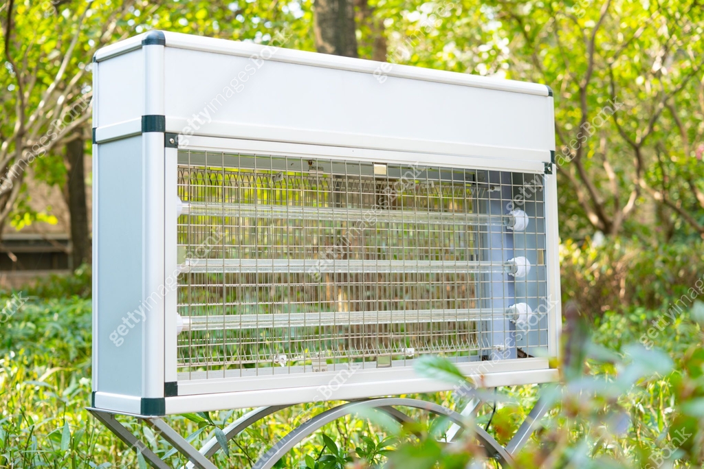 Insect Bank angle view outdoor electric mosquito and insect killer on the flower ...