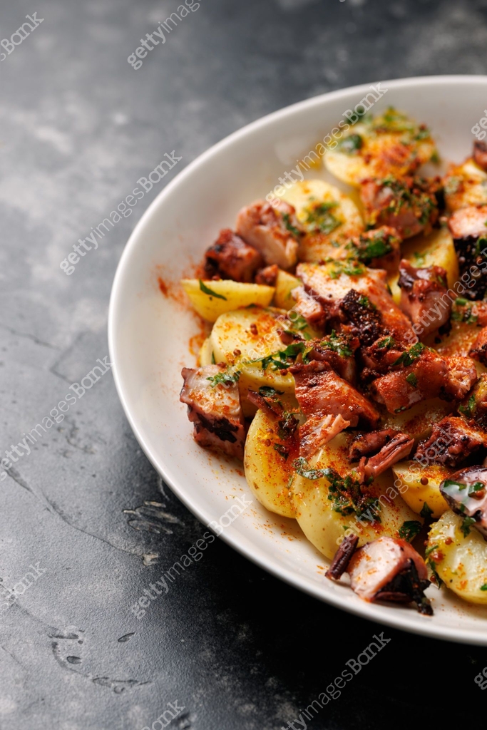 Octopus tentacles and new potatoes warm salad with smoked paprika ... Octopus tentacles and new potatoes warm salad with smoked paprika ...