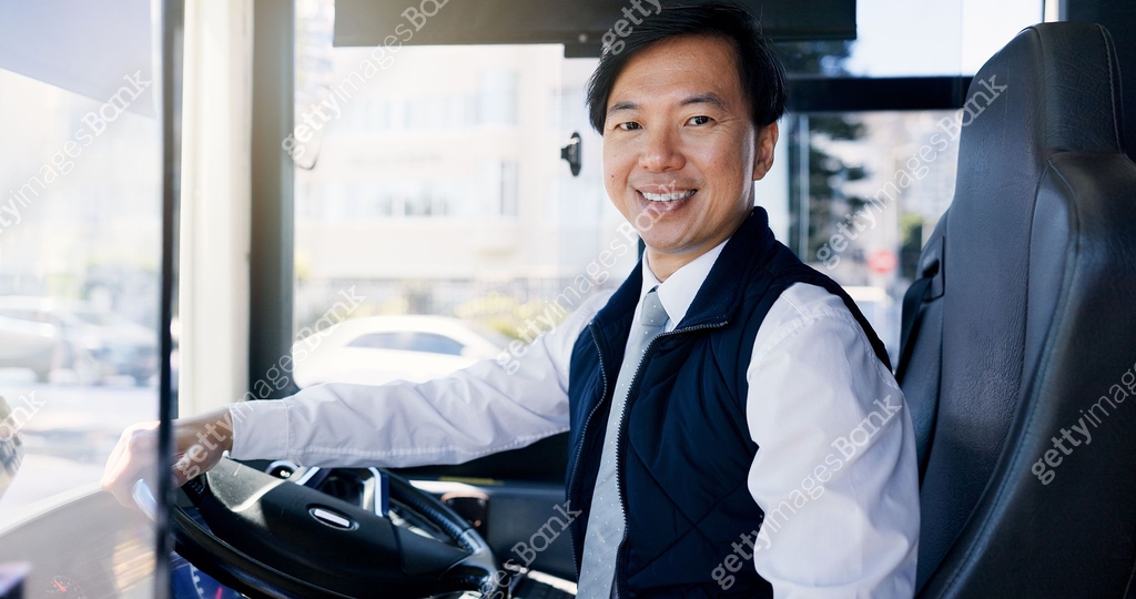 Bus driver, portrait and smile of Asian man at station for commute ...