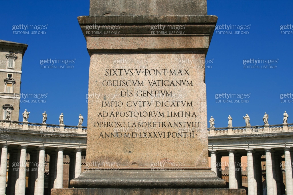 Latin Script on Obelisk and Tuscan Colonnade at St. Peter's Square ...