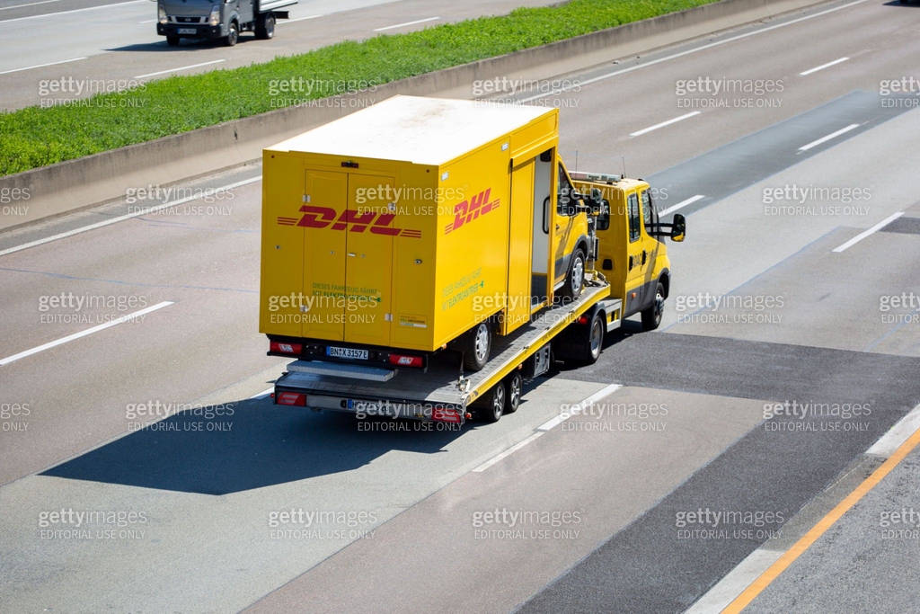 Damaged Electric Delivery Vehicle Of DHL 1392985692 damaged-electric-delivery-vehicle-of-dhl-1392985692