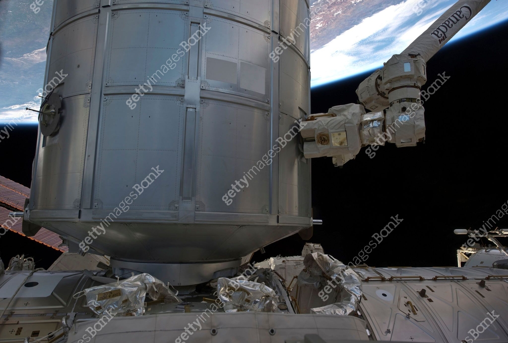 The Permanent Multipurpose Module in space shuttle Discovery's payload ...