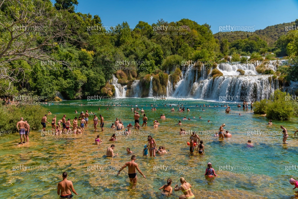 People Swimming At Krka River Near Skradinski Buk Waterfall Croatia people-swimming-at-krka-river-near-skradinski-buk-waterfall-croatia