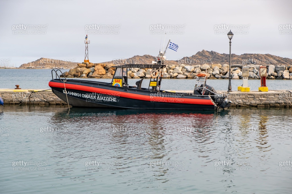 Paros island, Cyclades, Greece. Moored inflatable boat of Greek rescue ...