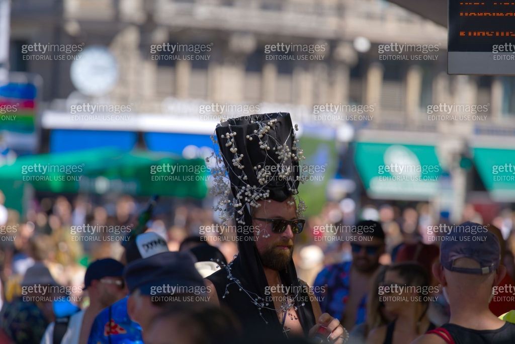 Wizard Dancing Rave Wizard raver with black dress and hat at open air techno event at Swiss ...
