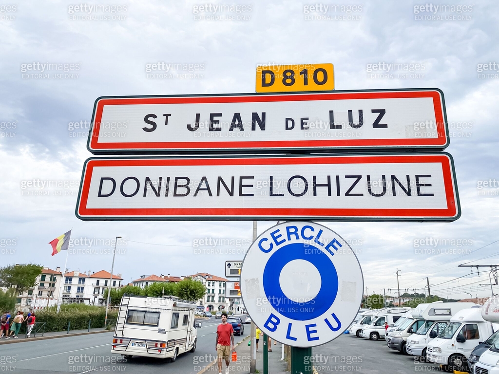 Basque Language Street Sign Bilingual French and Basque road sign at the entrance to Saint-Jean-de ...