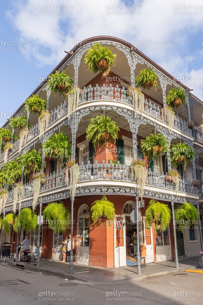 old french building with typical iron balconies in the french quarter ...