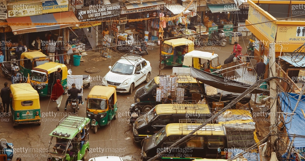 Traffic On The Main Bazar road Street Paharganj. Cars, Motorcycles ...