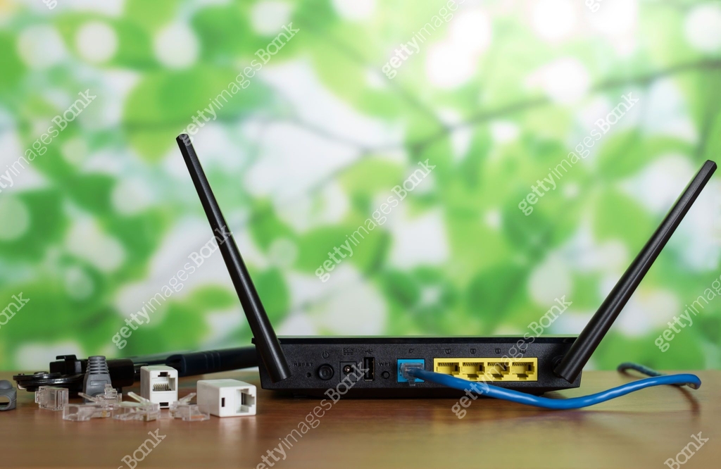 Router is connected to network, near on table spare connectors 이미지 ...