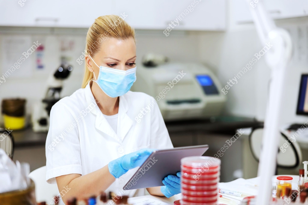 Lab Assistant Uniform Innovative experienced female lab assistant in white sterile uniform ...