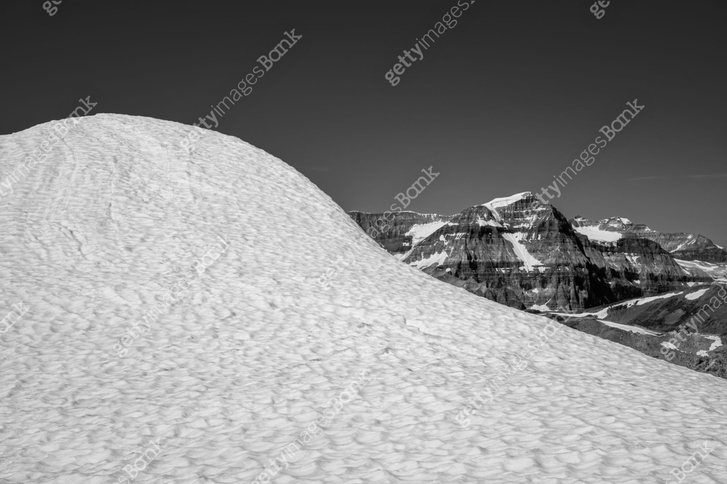Snow ridge with view of mountains, Banff National Park, Alberta Canada ...