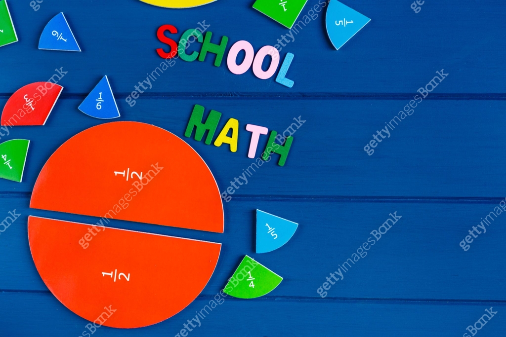 Close up mathematical fractions and colorful letters on blue background ...