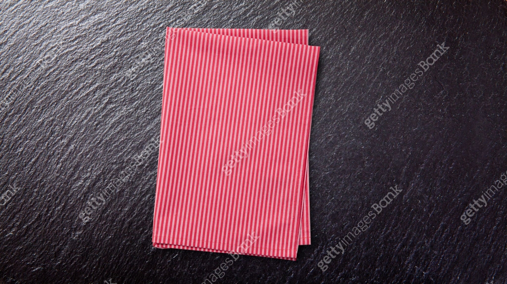 Red table cloth. Stack of colorful dish towels on desk 이미지 (1286136097 ...