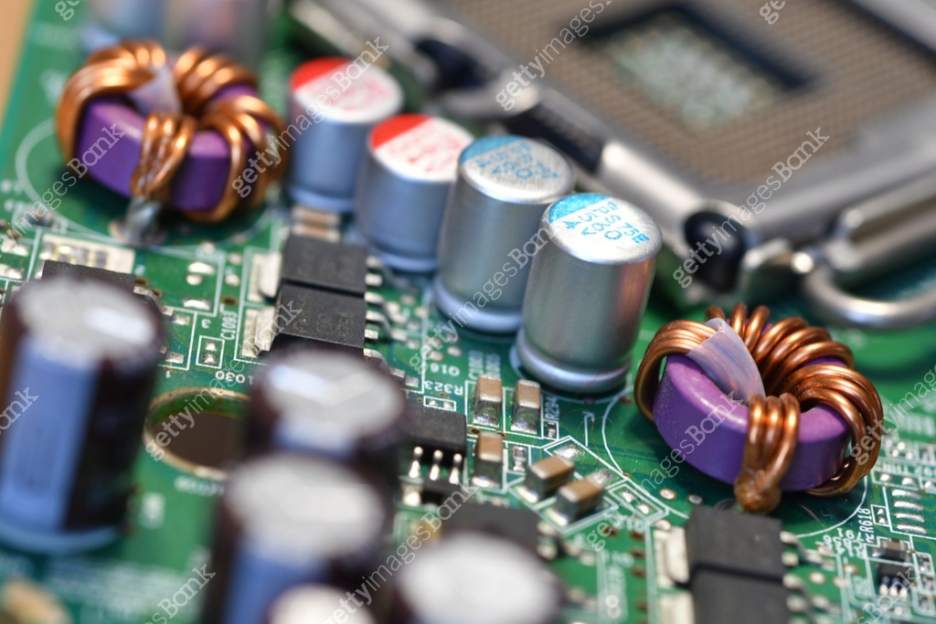 Extreme detail on the electronic components of a modern pc motherboard ...