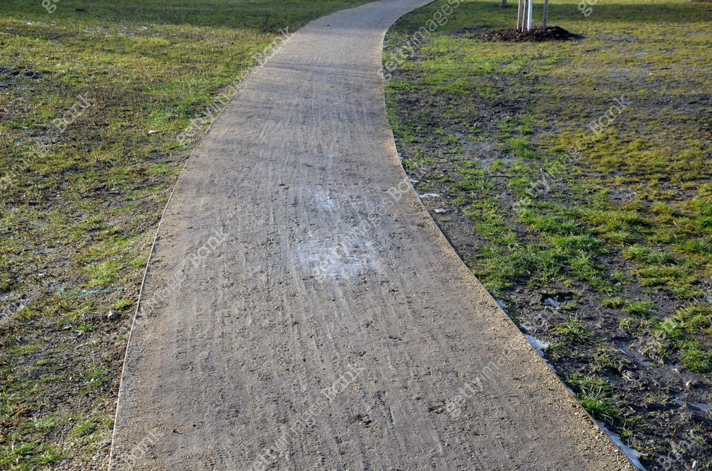 construction of a threshing gravel sidewalk, installation of a steel ...