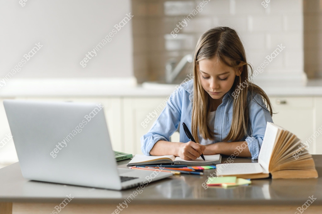 Distance Learning From Home Desk Distance learning, homeschooling during quarantine. Caucasian pretty ...