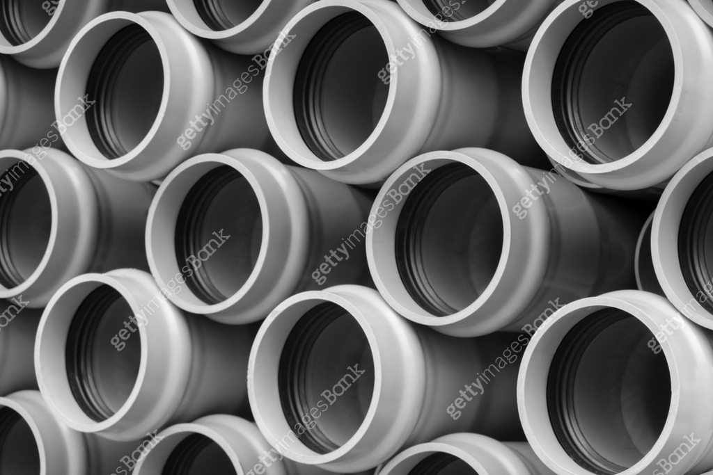 Stack of stored new PVC plastic pipes on the construction site 이미지 ...