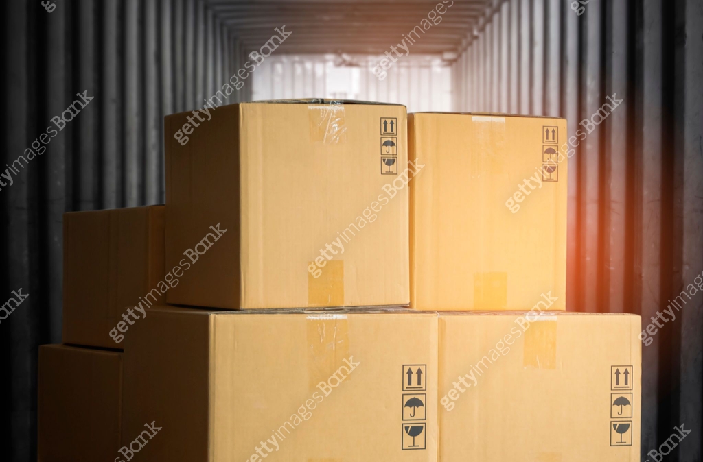 Inside A Container Box Stack of Package Boxes inside Cargo Container. Shipment Freight Truck ...