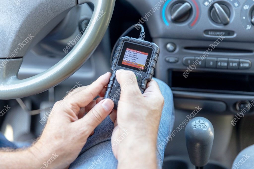 Code Reader Location Using diagnostic car code reader to erase error codes and turn off ...