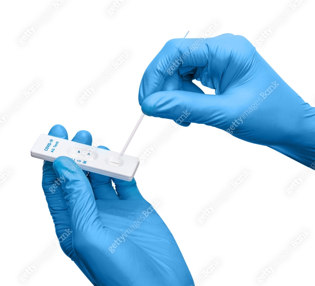 Testing Lab Card Scientist making a antigen rapid test kit for viral disease COVID-19 ...