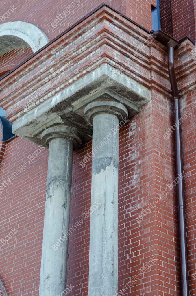 Two Red Column Red brick building with two gray columns. Concrete columns. Drai 이미지 ...