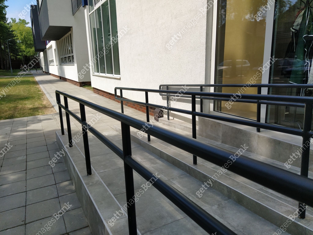 Disabled ramps next to the building's entrance. New school equipped ...