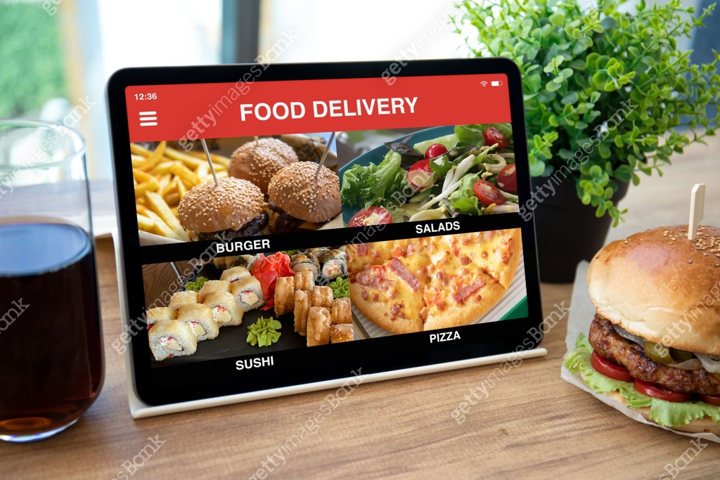 Food Over Computer computer tablet with app food delivery on screen in cafe 이미지 ...