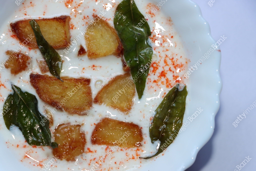 Potato raita or Aloo raita, Indian side dish served with rice, meals ...