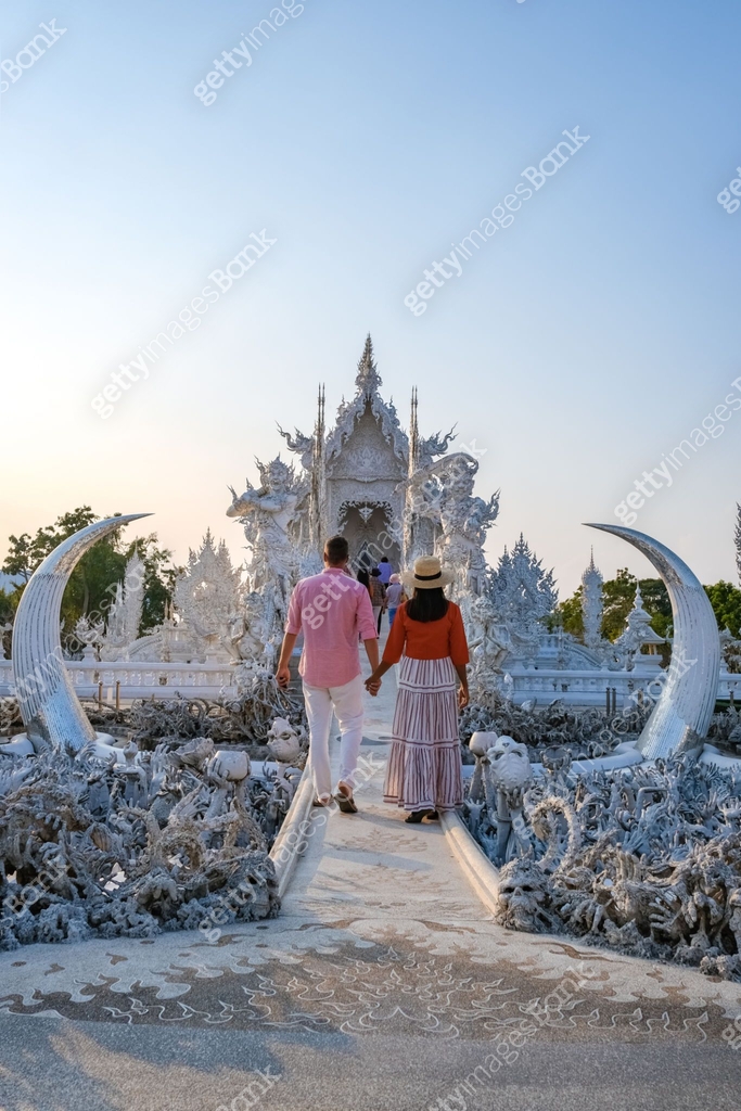 Evening Rong White temple Chiang Rai during sunset, Evening view of Wat Rong Khun or ...