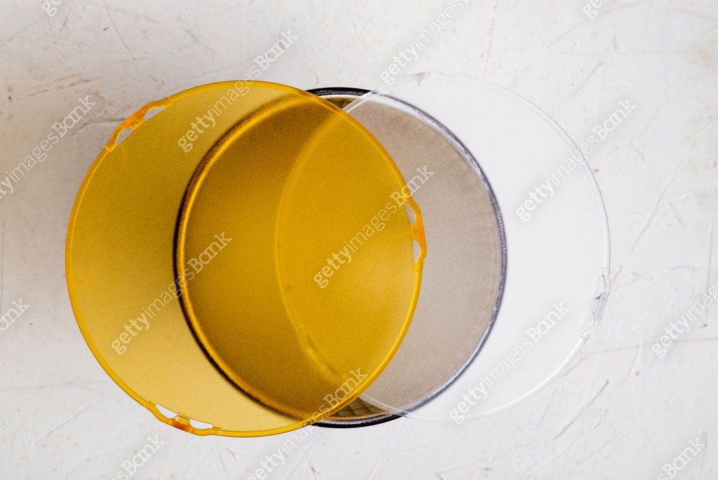 Standard reflector with matt white and yellow diffuser on a white ...