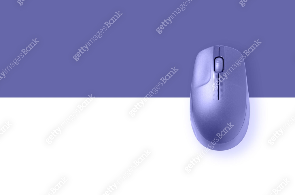 The computer mouse are purple. The trending color of 2022. Copy space ...