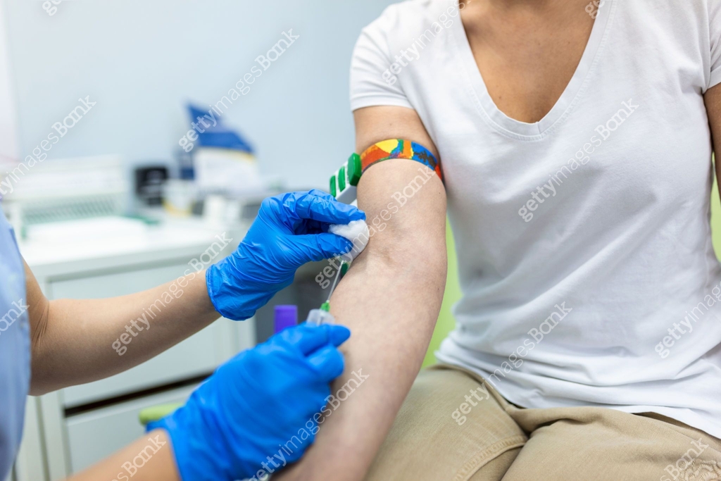 Patient Lab Aid Medical technologist doing a blood draw services for patient. lab ...
