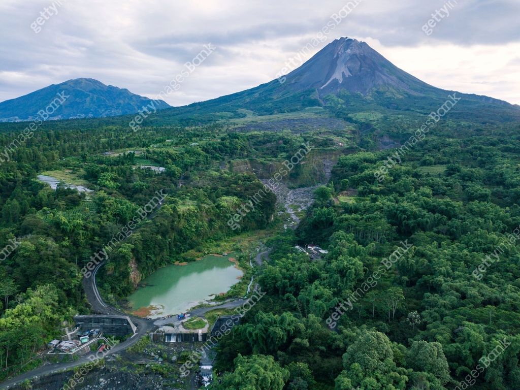 The view of Mount Merapi with the Bebeng River and a lake that holds ...
