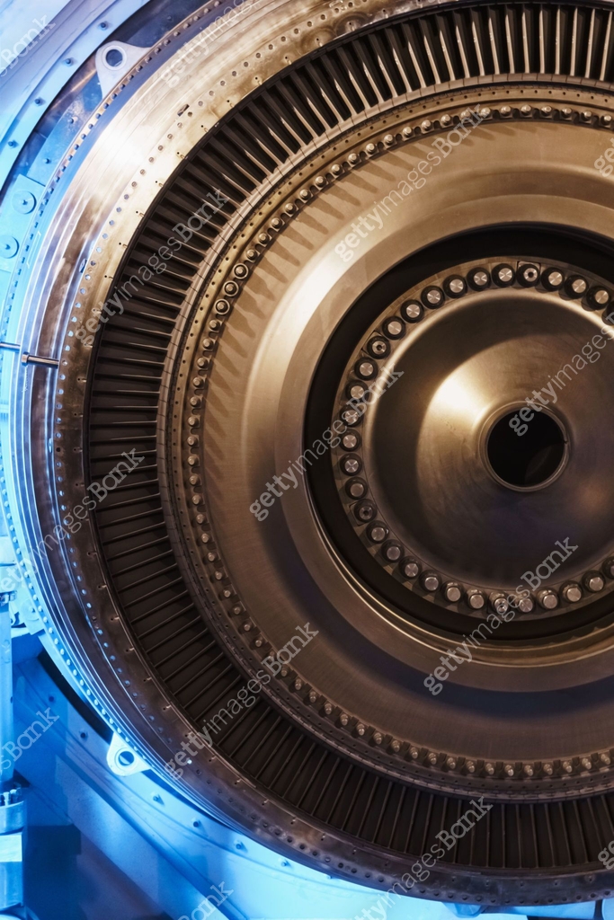 Gas Engine Rotor A rotor disc with blades of a turbojet gas turbine engine, inside view ...