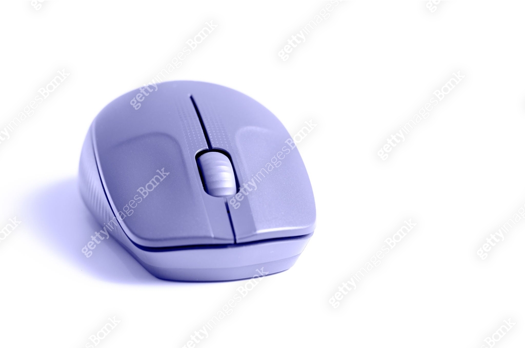 The computer mouse are purple. The trending color of 2022. Copy space ...