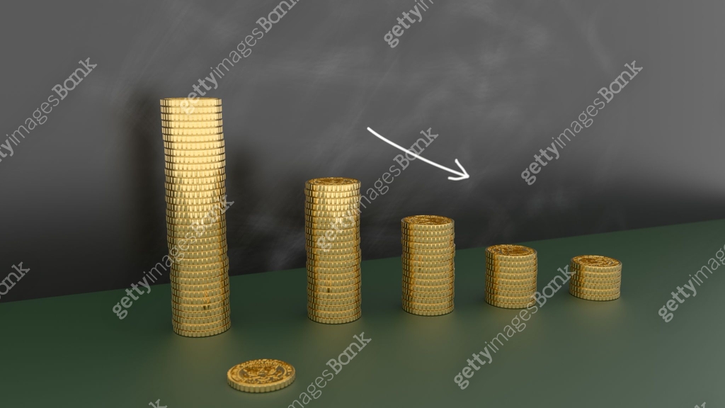 Money reduction concept image. Stacks of coins in a decrease financial ...