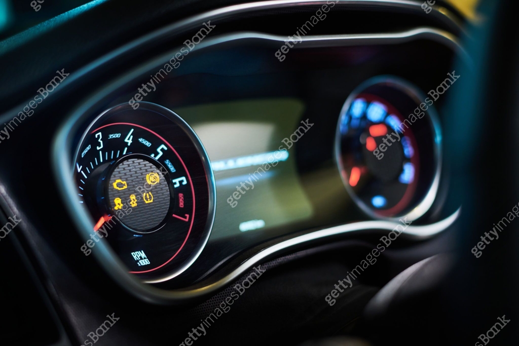Car Rear Instrument Part of car interior with instrument panel containing two speedometers ...