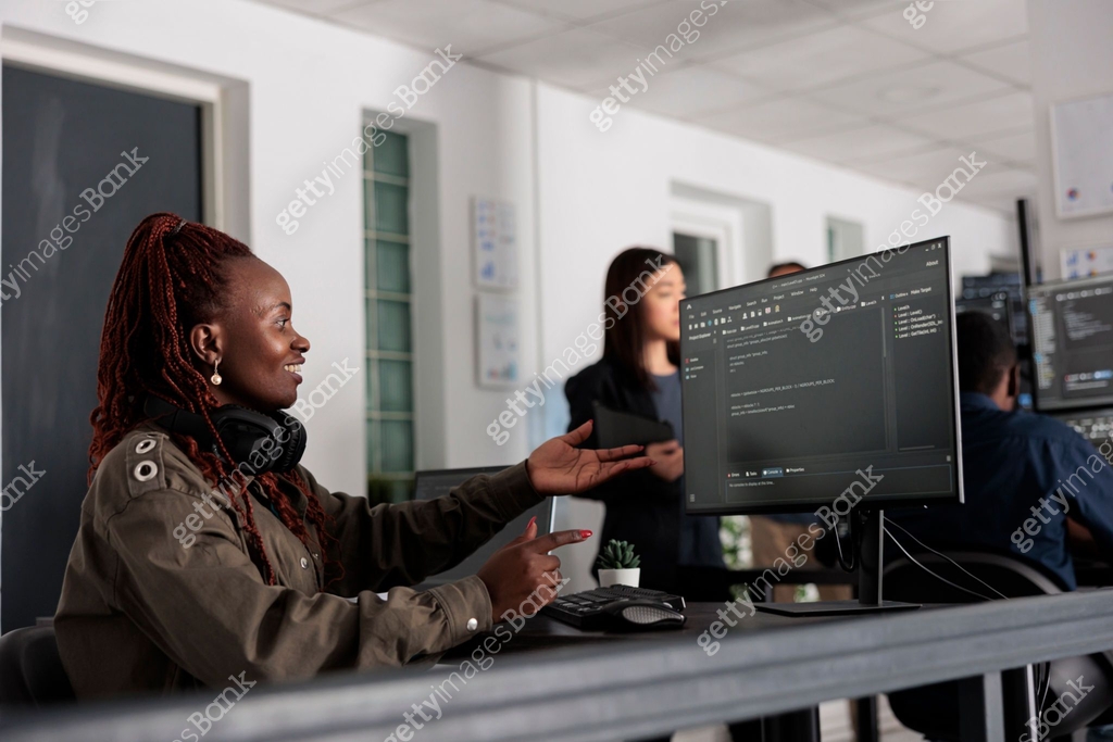 tech enginners programming server code algorithm on... Smiling software developer programming server code algorithm on ...