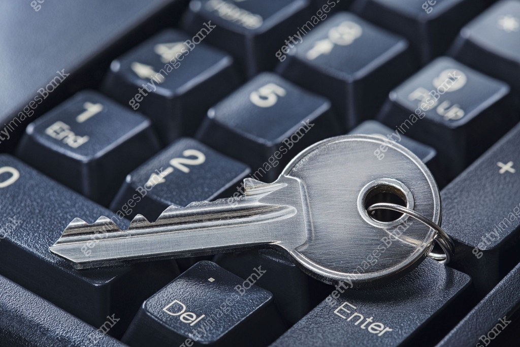 Key Computer Behind Protecting personal data and money , key on computer keyboard. 이미지 ...