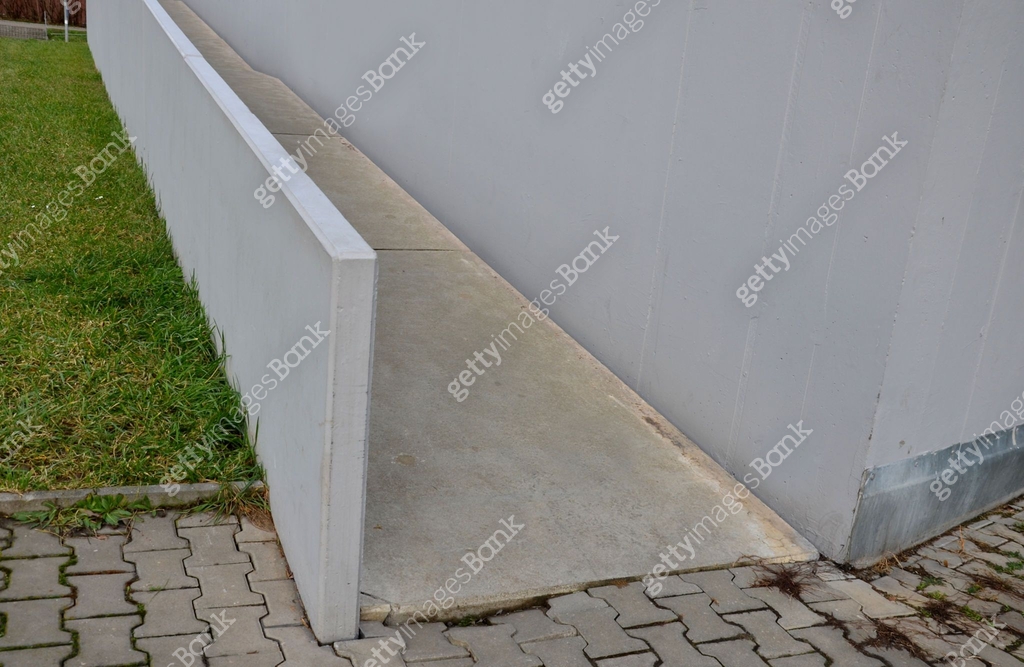 wheelchair ramp and stairs on the other side. height differences are ...